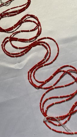 Tiny Dazzling stranded beads in tomato red
